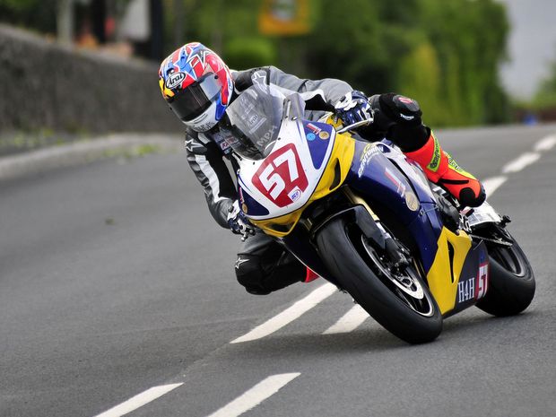 Dan Cooper on his Centurion Honda Superstock bike at Signpost Corner during second qualifying for the 2011 Isle of Man TT
